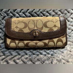Coach Logo C Monogram Print Tan and Brown Signature Large Turn Lock Wallet.